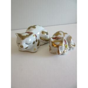 Two Small Antique Sleeping Kutani White Porcelain Cats with Gold Details